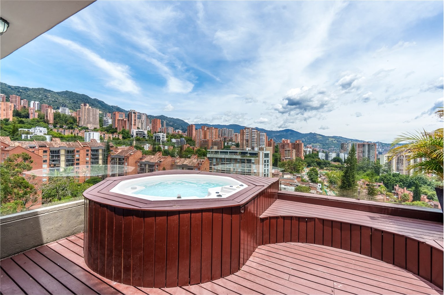 Terrace overlooking Medellín and its green hills